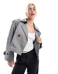 Stradivarius oversized cropped trench coat in slate gray | ASOS Chic Cropped Outerwear With Double-breasted Button Fastening, Chic Cropped Outerwear With Double-breasted Button, Trendy Gray Single Breasted Outerwear, Trendy Gray Single-breasted Outerwear, Winter Cropped Outerwear With Button Cuffs, Gray Spring Outerwear With Double Button Closure, Trendy Cropped Jacket With Lapel Collar, Cropped Outerwear With Button Cuffs, Spring Cropped Jacket With Double Button Closure