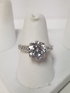 "Thanks for shopping our vintage estate store. We tend to sell well below wholesale and truly hope you enjoy all of our items. Many of the items are one of a kind, so please enjoy scrolling through the pictures and hopefully something will catch your eye. Black spots are from reflections. Nice estate sterling silver 925 3ct Cz Diamond gem stone filigree crown engagement ring. Bought these from a jewelry store that was closing. Ring size: 6 7 8 please select a size (can be sized for $10) We are a Classic Crystal Ring With Diamond Accents, Classic Crystal Ring With Center Stone, Vintage Solitaire Cubic Zirconia Jewelry, Vintage Cubic Zirconia Ring Stamped 925, Vintage Cubic Zirconia Jewelry Stamped 925, Classic White Diamond Ring Stamped 925, Classic 925 Stamped Diamond Ring, Classic Rings With Round Stone Stamped 925, Classic Cubic Zirconia Diamond Ring Stamped 925