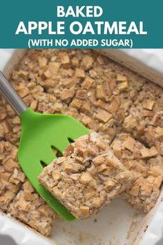 a green spatula scooping some food out of a dish with rice krispy treats