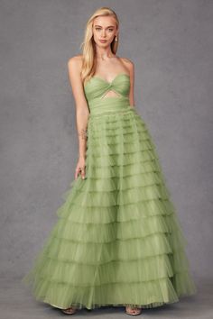 This dress is made with 100% polyester, ensuring quality and durability. The stunning neon pink and sage green colors are sure to make a statement, while the long A-line skirt adds elegance and sophistication. The sweetheart neckline and open back add a touch of glamor, making this the perfect choice for any formal occasion. Plus, the strapless design allows for effortless movement and comfort, so you can dance the night away without any restrictions. As a product expert, we guarantee this dress Ruffle Skirt Long, Special Ocassion Dresses, Ruffled Gown, Keyhole Dress, Tulle Ball Gown, Prom Designs, Designer Prom Dresses, Ruffled Skirt, Ruched Top