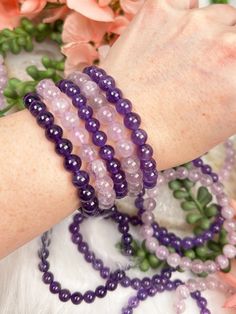 Amethyst beaded stretch bracelets are a popular accessory for those who love the beautiful purple hue of amethyst gemstones. Available in light and dark options of natural purple amethyst! These bracelets are made of small, polished amethyst beads strung together on an elastic cord, making them easy to slip on and off the wrist. Amethyst is known for its spiritual and healing properties, and wearing an amethyst beaded stretch bracelet is said to promote inner peace, clarity, and balance. Additio Purple Crystal Bracelet With 8mm Beads As A Gift, Spiritual Purple Crystal Bracelet, Purple Amethyst Stretch Bracelet As Gift, Lavender Gemstone Beaded Bracelets For Meditation, Spiritual Amethyst Purple Bracelets, Spiritual Amethyst Bracelets In Purple, Purple Amethyst Stretch Bracelet For Gift, Lavender Amethyst Beaded Bracelets For Meditation, Lavender Beaded Bracelets With 8mm Beads For Gift