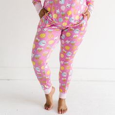 Woman wearing Pink Cookies & Milk pajama pants Pink Cotton Sweatpants For Pajama Party, Playful Cotton Joggers For Loungewear, Cute Pink Sleep Bottoms, Cute Pink Pants With Elastic Waistband, Casual Pink Sweatpants For Pajama Party, Casual Pink Sweatpants For Pajamas, Cute Pink Bedtime Pants, Pink Relaxed Fit Pants For Bedtime, Playful Pink Bottoms For Sleepover