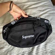 I Bought This From Original Drop (Not Re-Sale) Used Only Two Times It Looks And Feels Brand New. Can Be Worn As Waist Bag Or Sling Bag Over Shoulder. Adjustable Straps. Durable Has Two Pockets That Can Fit A Lot. Limited Release Dead Stock In Highly Sought After Black. Look At Pics From Product Descriptions And Prices Comparables On Stockx And Grailed. Black Tote Bag With Logo, Black Logo Bag For On-the-go, Black On-the-go Bag With Logo, Black Bags With Zipper Closure For Streetwear, Black On-the-go Bags With Logo, Black Streetwear Bag With Zipper Closure, Modern Crossbody Bags For Streetwear, Black Large Capacity Chest Bag For Streetwear, Black Chest Bag With Zipper Pocket For Streetwear