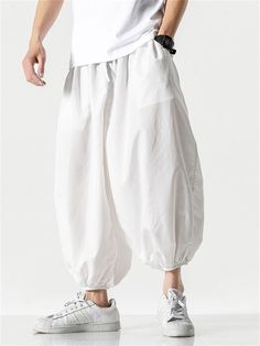 Description Product ID: MBT2031420 Material: Cotton, Polyester Pattern: Solid Season: Summer Style: Casual Occasion: Daily, Street, Vacation Package included: 1 * Pants Size Chart (Asian Size): Please allow 1-3 cm measured error. Size Length Waist Hip M 90cm | 35.4 in 68cm | 26.8 in 172cm | 67.7 in L 91cm | 35.8 in 71cm | 28.0 in 174cm | 68.5 in XL 92cm | 36.2 in 74cm | 29.1 in 176cm | 69.3 in XXL 93cm | 36.6 in 77cm | 30.3 in 178cm | 70.1 in 3XL 94cm | 37.0 in 80cm | 31.5 in 180cm | 70.9 in 4XL 95cm | 37.4 in 83cm | 32.7 in 182cm | 71.7 in 5XL 96cm | 37.8 in 86cm | 33.9 in 184cm | 72.4 in White Loose Fit Ankle-length Harem Pants, White Ankle-length Harem Pants With Loosely Fitted Hips, White Baggy Casual Harem Pants, Baggy Parachute Pants For Summer, White Casual Harem Pants With Elastic Waistband, Casual White Harem Pants With Elastic Waistband, White Harem Pants With Pockets And Loose Fit, Spring White Loose Fit Harem Pants, Spring White Loosely Fitted Harem Pants