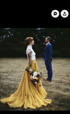 a man and woman standing next to each other in a field