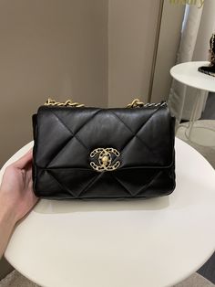 Chanel 19 Flap BagBlack Lambskin AGHWSmall 26 x 17 x 8 cmChain drop 46 cmMicrochipMarch 2022New Kept Unused (minimal storage sign if any otherwise new)Includes full set box, dust bag and receiptRTP 9160 sgdPrice now 7400 sgd 5500 usd CN5530-01 Storage Sign, Chanel 19 Flap Bag, Designer Bags Louis Vuitton, Chanel 19, Burberry Sunglasses, Gold Ounce, Flap Bag, Full Set, Chanel Bag