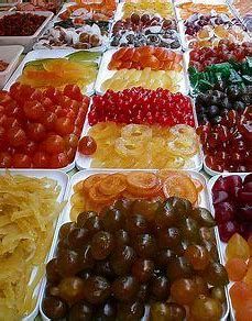 many different types of fruits and vegetables on display