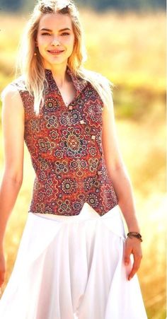 I made this sleeveless summer shirt from cotton fabric. It is produced from completely natural materials. It is light and comfortable. This ethnic pattern bohemian blouse with asymmetrical cut coconut button detail and mandarin collar will be perfect on you. #blousepattern #blouseswomencotton #bohoblouse #asymmetricalblouses #bohemianclouse #japanesetop #summershirtboho #womentopssummer #bohogifts #womenshirtstrendy #ethnicfashion Bohemian Blouse, Cotton Shirts Women, Asymmetrical Cut, Asymmetrical Blouse, Bohemian Blouses, Boho Blouse, Ethnic Patterns, Womens Tops Summer, Fashion Design Sketches