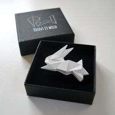 This Origami brooch is perfect for nature lovers and fans of modern jewellery. It adds whimsical charm and a touch of originality to both casual and formal looks. The black and white colours make it super versatile, complementing any outfit. Whether you are wearing it as a cute lapel pin on a regular day or as a special piece for a wedding ensemble, it will stand out wherever you go. Whether you're treating yourself, your mom, your friend, your wife, or your husband, this brooch is a bold additi Origami Rabbit, Wedding Lapel, Lapel Pins Wedding, Lover Wedding, Dinosaur Room, Rabbit Lover, Brooches Handmade, Sweet Gifts, Contemporary Jewelry