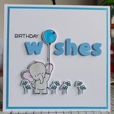 a birthday card with an elephant holding a balloon and the words wishes written on it