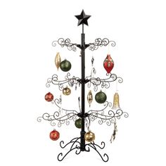 a metal christmas tree with ornaments hanging from it's sides and a star on top