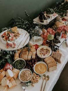 an assortment of food is displayed on a table