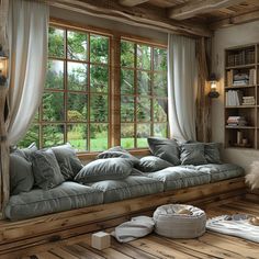 a living room filled with furniture and lots of windows