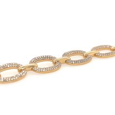 This beautiful oval link diamond bracelet is designed to be mixed and matched with similar styles, and it looks just as great worn solo, too. Elegant and timeless, made from 14-karat yellow gold and encrusted with scores of sparkling pavé diamonds, totaling 2.76-carats.- Length: 6.5 inches-Width: Approximately 11.5 mm (measures from the widest part)- Weight: 10.6 grams- The piece has been certified in accordance with the hallmark of "14K" and "TD". This piece comes with a beautiful jewelry box. Gold Diamond Bracelet With Oval Links And Accents, Gold Oval Link Bracelet With Diamond Accents, Gold Oval Diamond Bracelet, Gold Oval Diamond Bracelet With Cubic Zirconia, 14k Yellow Gold Oval Link Diamond Bracelet, Oval Gold Diamond Bracelet, Yellow Gold Oval Link Tennis Bracelet, Yellow Gold Oval Link Diamond Bracelet, Oval Cubic Zirconia Diamond Bracelet In Yellow Gold