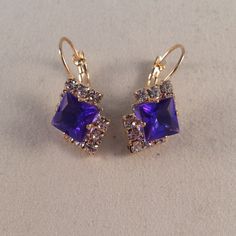 These Beautiful Mystical Pink Purple Diamond Square Princess Cut Czech Crystal Earrings Are Gold Plated. Brand New And Never Been Worn. Lead And Nickel Free. These Fine Quality Earrings Are Perfect For Everyday Wear, Special Occasions, Or A Special Gift. Get An $18 Gift Of Your Choice In My Listings With Purchase Of Two Or More Items. Please Send Offers And Questions. Large Crystal: 8mm Fastening: Clip Back Dangle (Pierced) Purple Crystal Drop Earrings For Evening, Purple Drop Crystal Earrings For Evening, Nickel-free Purple Earrings For Party, Purple Dangle Earrings For Evening, Purple Diamond, Large Crystal, Pink Jewelry, Czech Crystal, Ear Rings