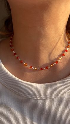 Classic rosary style necklace with carnelian for everyday wear. It's original jewelry, beaded by hand, using only natural gemstone beads. You can also combine in a lot of ways with your own jewelry and your casual or festive outfits.  PLEASE NOTE, COLORS might be different because of the nature of stones and your monitor! LENGTH: 3 cm exstension chain.  CLOSURE: lobster clasp. MATERIALS: 4 mm carnelian gemstones, furniture can be: stainless steel, silver filled (has a % of silver in it) or 925 s Agate Beaded Chain Necklaces As Gifts, Agate Beaded Necklace As A Gift, Carnelian Jewelry With Colorful Beads For Jewelry Making, Adjustable Carnelian Jewelry With Colorful Beads, Spiritual Orange Beaded Necklace, Orange Carnelian Beaded Necklace For Gift, Beaded Carnelian Round Beads Necklace, Carnelian Beaded Crystal Necklaces For Healing, Amber Beads For Gift