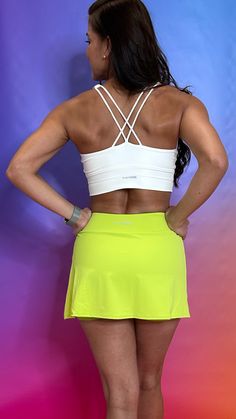 Be bold and adventurous with our Adventure Skirt in Neon Green! Whether you're hitting the beach, the city, or just taking a stroll, this skirt will add a pop of color and functionality. Built-in shorts and a pocket make it perfect for any occasion, while its antibacterial and quick dry features keep you feeling fresh and comfortable. It's time to add some bright vibes to your wardrobe! Summer Green 4-way Stretch Tennis Skirt, Green 4-way Stretch Tennis Skirt For Summer, Green Tennis Skirt With 4-way Stretch For Summer, Green Summer Tennis Skirt For Workout, Summer Green Tennis Skirt For Workout, Green Tennis Skirt For Summer Workout, Stretch Skirt For Gym In Summer, Stretch Skirt For Summer Gym, Sporty Fitted Tennis Skirt For Beach