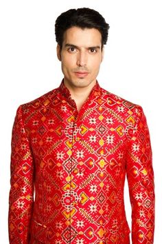 Red bandhgala featuring patola pattern all over. Paired with a solid pant. - Aza Fashions Festive Traditional Fit Bandhgala With Cutdana, Traditional Bandhgala With Zari Weaving For Formal Occasions, Red Sherwani For Festivals With Straight Kurta Shape, Red Sherwani For Festivals With Straight Kurta Style, Formal Sherwani With Zari Weaving, Red Sherwani For Festivals, Red Bandhgala For Eid With Straight Kurta Shape, Formal Festival Kurta With Zari Weaving, Formal Bandhgala With Zari Weaving For Eid