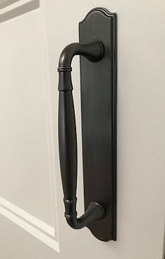 an open door with a black handle on it