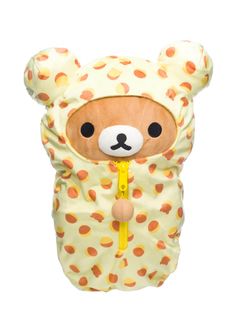 a teddy bear wearing a yellow and orange polka dot print cover with a hood on