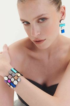 Elevate your wristwear with our Bauhaus Collection Bracelet, a reflection of 20th-century design, art, and architectural movements. Inspired by craftsmanship, modernism, and spatial exploration, this bracelet seamlessly integrates with the vibrant hues of our Rainbow Collection, infusing your days with a burst of colors. 🌈 Effortless Chic Design: Indulge in the comfort of our Bauhaus Collection Bracelet, featuring a chic design crafted with precision and attention to detail. The snap button closure adds a touch of ease and style. 🔍 Material Excellence: Fashioned from a fusion of leather and acrylic, this bracelet is chic and lightweight. 🎁 Inclusive Packaging: Your statement bracelet arrives in exquisite gift packaging, presented in a fabric-lined folio that protects the jewelry finish. Architecture Movement, Engagement Icon, Wedding Ring Icon, Workshop Icon, Chevron Wedding Ring, 20th Century Art, Chevron Earrings, Bracelet Rainbow, Primary Colours