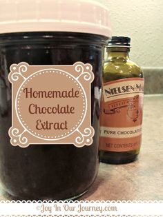 a jar of homemade chocolate extra next to a bottle of olive oil