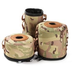 three rolls of toilet paper in different colors and patterns, one has a brown leather top