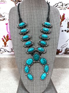 Full Squash Blossom Natural Turquoise Necklace * Natural stone may vary in size, color, or shape * 28" long necklace & 3 toggle * 6mm navajo pearl * 4" long pendant * 180 grams weight * Alloy metal * Antique silver plate * Nickel, Lead & Chrome free Squash Blossom Necklace Outfit, Turquoise Squash Blossom, Necklace Outfit, Chic Heels, Rose Boutique, Wild Rag, Squash Blossom Necklace, Coin Purse Wallet, Squash Blossom