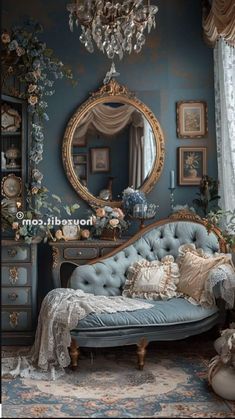 an ornately decorated living room with blue walls and antique furniture, including a chaise lounge