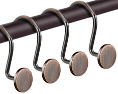 three round knobs are attached to a rail