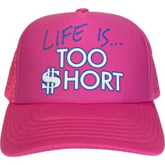 A unisex adjustable snapback trucker hat in pink, with Too $hort "Life Is..." graphic printed on the front. One size fits most. Pink Snapback Hat For Streetwear With Flat Brim, Casual Pink 5-panel Snapback Hat, Hip Hop Pink Baseball Cap For Streetwear, Pink Hip Hop Baseball Cap For Streetwear, Pink Letter Print Flat Bill Trucker Hat, Pink Snapback Hat With Flat Bill For Summer, Pink Fun Snapback Hat With Flat Bill, Pink Snapback Hat With Letter Print And Curved Bill, Fun Pink Snapback Hat With Flat Bill