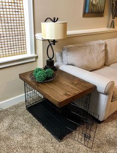 a living room with a couch, coffee table and lamp on top of the floor