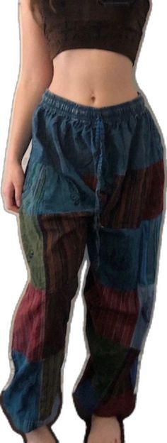 Hippie Wide Leg Patchwork Pants, Hippie Wide-leg Patchwork Pants, Casual Patchwork Pants For Festival, Casual Festival Pants With Patchwork, Bohemian Multicolor Patchwork Bottoms, Multicolor Patchwork Wide Leg Harem Pants, Bohemian Multicolor Patchwork Pants, Hippie Blue Patchwork Bottoms, Bohemian Festival Pants With Patchwork