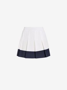 Featuring an inner short with side pockets for on-court play, this skort is made from our lightweight and breathable Soft Stretch Woven fabric. The contrast hem panel adds a contemporary twist to traditional tennis attire. Tennis Skort, Mid Rise, Woven Fabric, Color Block, Blue