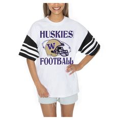 Showcase your Washington Huskies pride in style with the Gameday Couture Starting Lineup Contrast Sporty Heritage Oversized T-Shirt. The oversized fit provides a trendy and relaxed look, making it perfect for game day or any casual occasion. Made from 100% cotton, this tee offers exceptional comfort and breathability, ensuring you stay cool and confident while cheering on the Washington Huskies. White Oversized Tops For School Spirit, Collegiate Oversized Top With Graphic Print, Oversized Collegiate Top With Graphic Print, Oversized Collegiate T-shirt For College, Varsity Tops With Text Print, Collegiate Oversized Tops With Logo Print, Oversized Varsity T-shirt For Game Day, Oversized Varsity T-shirt With Letter Print, Oversized Letter Print Tops For Game Day