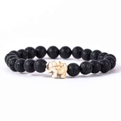 Give friends and family meaningful jewelry with a mission. This bracelet from Fahlo is enhanced with an assigned real elephant to track online. A portion of all proceeds is donated to Save the Elephants in Kenya. Help save the elephants with a beautiful lava stone beaded bracelet with elephant charm and learn your elephant's name, size and get their picture. Each bracelet comes with a different real wild animal to track on your phone, tablet or computer. | Stretch bracelet features elephant and Tracking Bracelet, Yoga Bracelet Beads, Yoga Beads, Bracelet Packaging, Wild Elephant, Chakra Beads, Lava Stone Bracelet, Save The Elephants, Elephant Bracelet