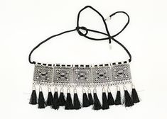 This traditional choker necklace with black tassels is a cool one as it can with a variety of outfits and is an 'evergreen' design.  It is a classy and elegant bohemian choice. #tlb #bohogift #Indian #Handmade #TribalBlackChoker Adjustable Tassel Necklace With Fringe For Festivals, Adjustable Fringe Tassel Necklace For Festival, Adjustable Elegant Tassel Necklace For Festival, Festival Fringe Choker Necklace, Fringe Choker Necklace For Festival, Black Tassel Necklace With Adjustable Fit, Adjustable Tassel Necklace With Fringe For Party, Adjustable Black Tassel Necklace, Black Fringe Jewelry For Festival