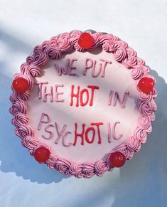 a pink cake with writing on it that says, we put the hot in sync