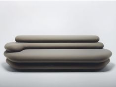 three rectangular shaped objects sitting on top of each other