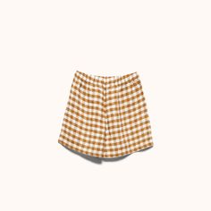 Our gingham sleepwear is woven from 100% French flax linen and pre-washed for extra softness. The Esme Short is a modern take on classic boxers with a high rise relaxed fit and faux button fly. Gingham Cotton Shorts For Daywear, Cotton Gingham Pajama Shorts With Elastic Waistband, Plaid Cotton Shorts For Daywear, Plaid Cotton Summer Sleepwear, Cotton Gingham Shorts For Loungewear, Summer Gingham Cotton Sleepwear, Spring Gingham Loungewear Bottoms, Gingham Bottoms For Spring Loungewear, Summer Gingham Loungewear Bottoms