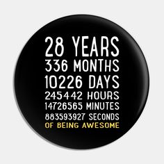 a black and white button with the words 28 years 35 months 120 days 24 hours