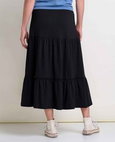 Seasonal transitions are easy when you’ve got the right skirt. This tiered midi is flowy and feminine, but organic cotton, TENCEL™ Lyocell and a little stretch mean she’s practical as she is pretty. Casual Relaxed Maxi Skirt With Layered Hem, Casual Tiered Skirt For Layering, Casual Tiered Skirt Bottoms For Layering, Casual Maxi Skirt With Layered Hem, Black Stretch Tiered Skirt, Black Midi Length Gathered Skirt, Non-stretch Cotton Tiered Skirt, Black Mid-rise Cotton Skirt, Black Full-length Relaxed Skirt