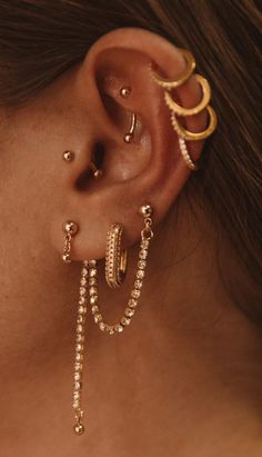 Elegant 14k Gold Dangle Piercings, Gold Piercings With Diamond Accents In 14k Gold, 14k Gold Piercings With Diamond Accents, Gold Cubic Zirconia Ear Cuff Gift, Yellow Gold Dangle Ear Cuff, Gold Dangle Cartilage Earrings For Party, Yellow Gold Dangle Ear Cuff For Pierced Ears, Gold Diamond Hoop Piercings, Gold Diamond Piercing