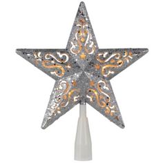 a silver and gold star decoration on top of a white pole