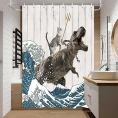 a shower curtain with an image of a dinosaur and cat riding on the back of a t - rex