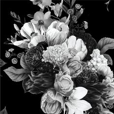 black and white photograph of flowers in a vase