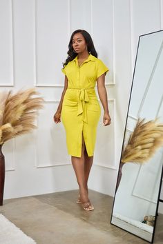 FEATURES Button front Midi Length Collared Removable waist tie CONTENT & CARE Polyester/Spandex Hand wash with cold water Do not bleach Line dry DEETS & FIT Model is wearing a size Medium Fabric has some stretch Model profile: Uche is 5'9" and measures 34 (bust) 29 (waist) and 45 (hips) Fitted Yellow Belted Dress, Fitted Shirt Dress With Tie Fastening For Daywear, Fitted Collared Dress With Tie Waist, Fitted Collared Shirt Dress With Tie Waist, Model Profile, Model Profiles, Yellow Dress, Waist Tie, Midi Length