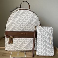 100% Authentic Mk Kenly Md Backpack Comes With A Matching Wallet Vanilla And Gold Hardware **Brand New With Tags** Approximate Measurements 10"L Bottom X 11.5"H X 4.5” D Luxury White Leather Backpack With Adjustable Strap, Luxury White Backpack With Detachable Strap, White Leather Backpack With Dust Bag, White Leather Backpack With Zipper Closure For Everyday, White Luxury Backpack With Removable Pouch, Luxury White Backpack With Removable Pouch, White Luxury Leather Backpack For Daily Use, Luxury White Leather Backpack For Daily Use, Luxury White Backpack For Errands