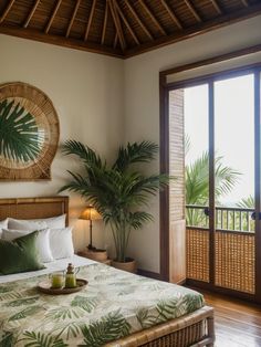 a bed in a bedroom next to a window with a palm tree on top of it