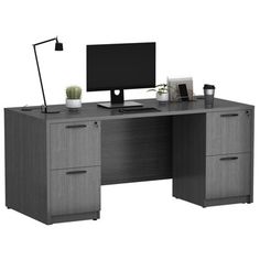 an office desk with two drawers and a computer monitor